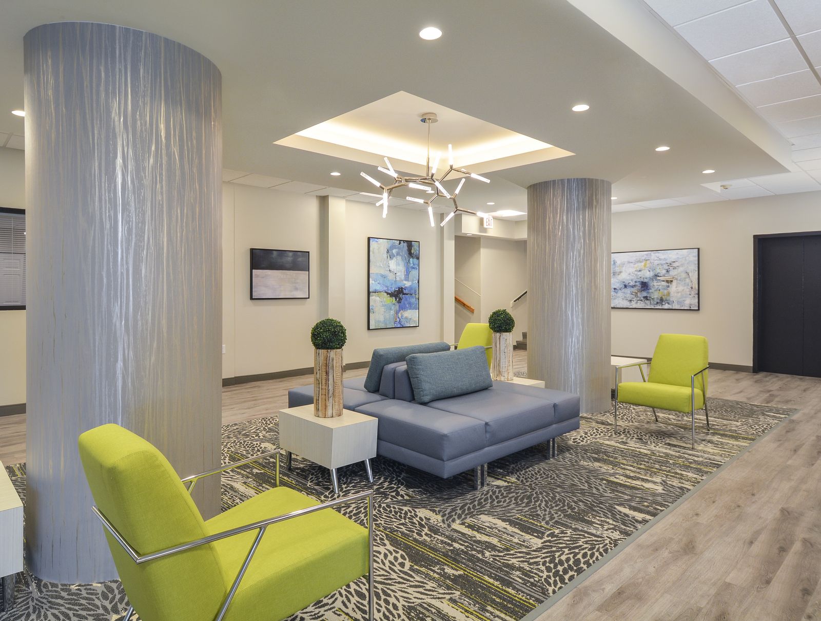 Lobby lounge with seating and modern lighting